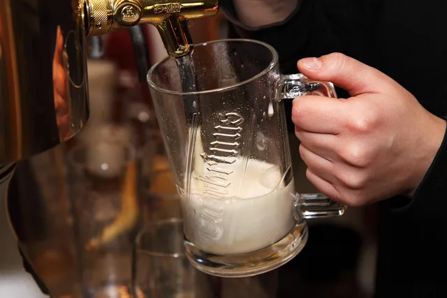 alcohol, bar, beer, beverage, booze, brew, bubbles, counter, drink, foam, froth, glass, golden, hand, handles, lager, liquid, pint, pour, pub, refreshment, restaurant, service, taps, yellow, brown restaurant, brown bubbles, brown service, beer, beer, beer, booze, brew, drink, froth, lager, pint, pint, pint, pint, pint, pub, pub, pub, restaurant. California taproom beer payroll rules: tips, breaks, overtime