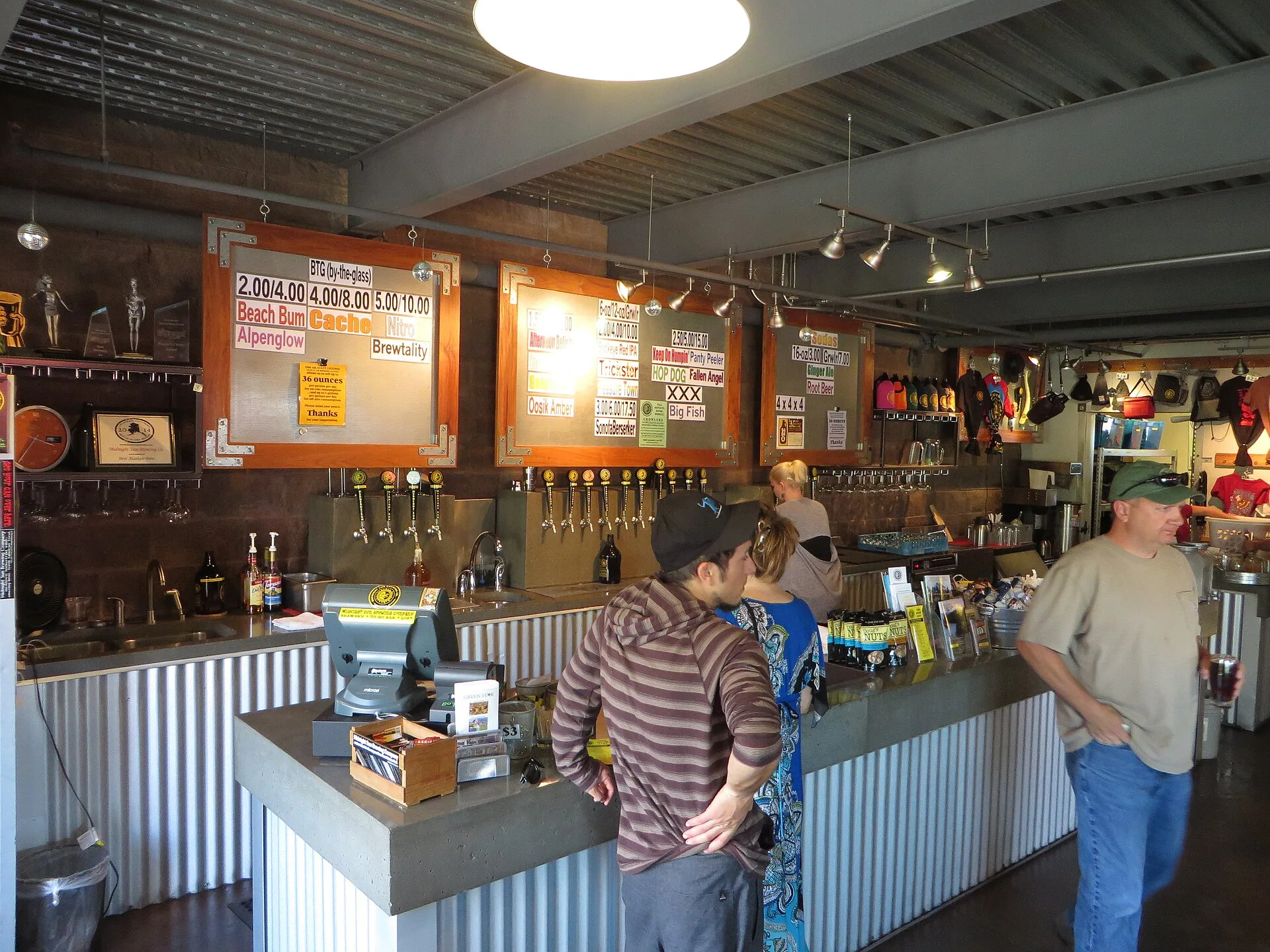 View of the bar at The Loft of the Midnight Sun Brewing Company, which is their official taproom, located directly above the brewery in Anchorage, Alaska. At their taproom, Midnight Sun offers 16 beers on tap, ranging from light summer ales, via hoppy and spicy ales to heavy porters. On my visit in. Which low-ranking brewery and taproom products still earn their place