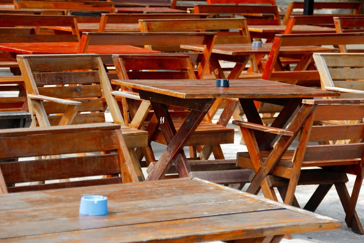 patio, beer garden, chairs, tables, wood, gastronomy, restaurant, outdoor catering, garden furniture, nature, summer, outdoors, seating. Seasonal taproom staffing in Wisconsin and Florida compared