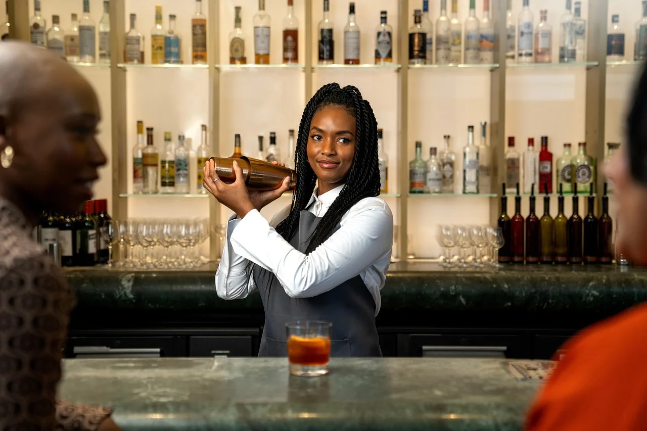 woman, bartender, cocktails, drinks, bar, friends, party, whiskey, old fashioned, hospitality, bartender, bartender, bartender, bartender, bartender, hospitality, hospitality. How to Set Up Taproom Tip Pooling Without Breaking FLSA Rules