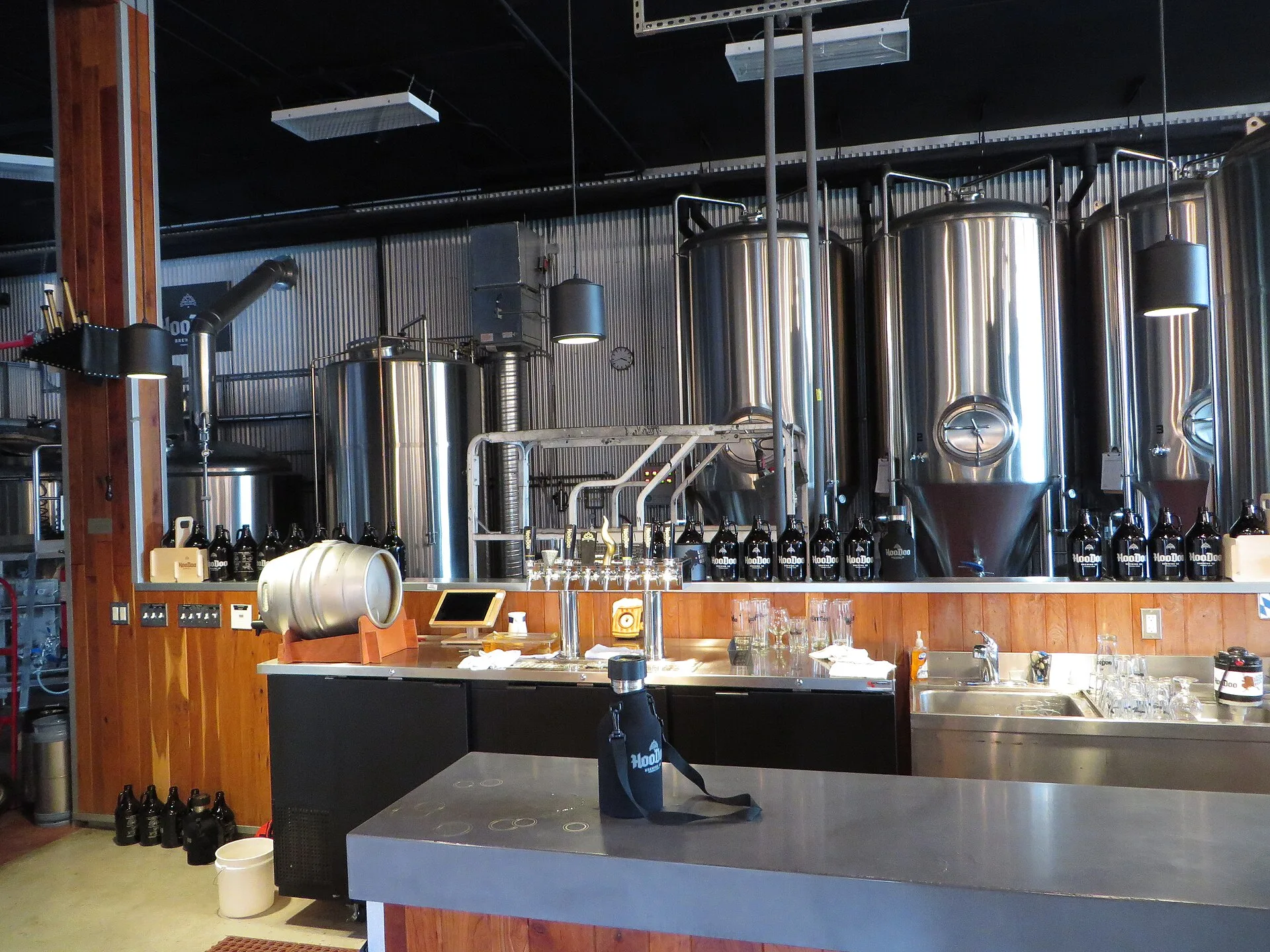 The brewery of HooDoo Brewing Company is clearly visible from the taproom, which is the way the owners want it - their customers should be able to see where the beer is made while they enjoy it at the bar. Brewery and taproom operations: Texas permits and payroll
